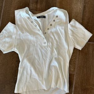 Peep shoulder knit top